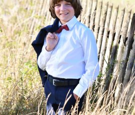 Portrait eines Jungen an seiner Kommunion - authentische Kommunionfotos im Saarland