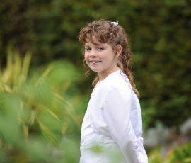 Portrait eines Mädchens an seiner Kommunion - authentische Kommunionfotos im Saarland